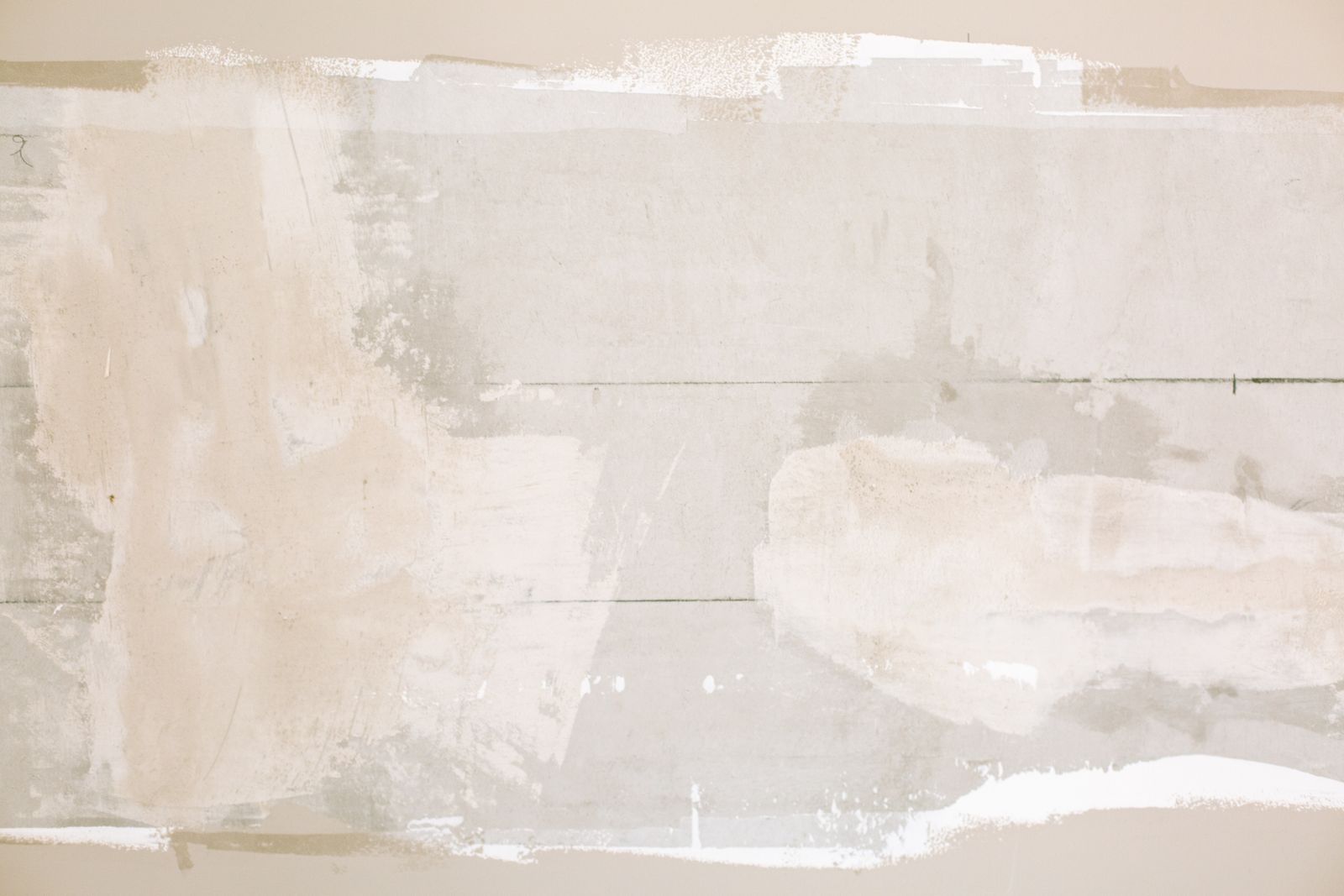 Close-up of a part-skimmed plaster surface
