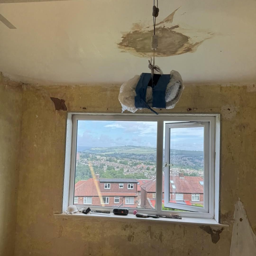 Before: damaged ceiling and bare wall, Hughes Plastering Services